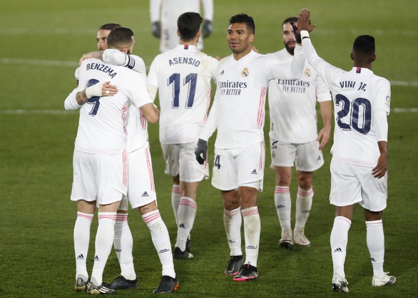 Đánh bại Granada, Real Madrid tiếp tục bằng điểm Atletico Madrid - Ảnh 1. Đánh bại Granada, Real Madrid tiếp tục bằng điểm Atletico Madrid - Ảnh 1.