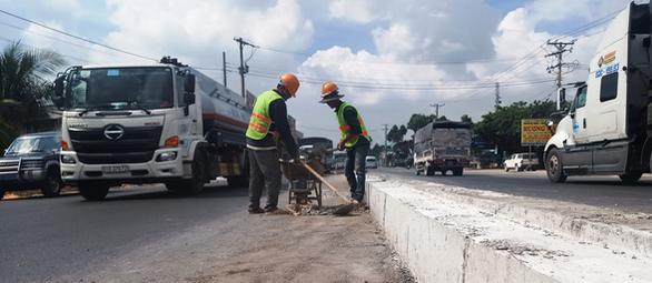 Thông xe cầu Mỹ Quý và Rạch Miễu giải quyết kẹt xe trên quốc lộ 1 - Ảnh 1.