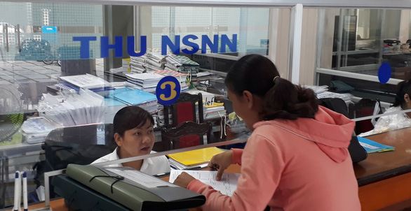 Năm 2020, tổng số thu thuế, phí, lệ phí vượt kế hoạch - Ảnh 1.