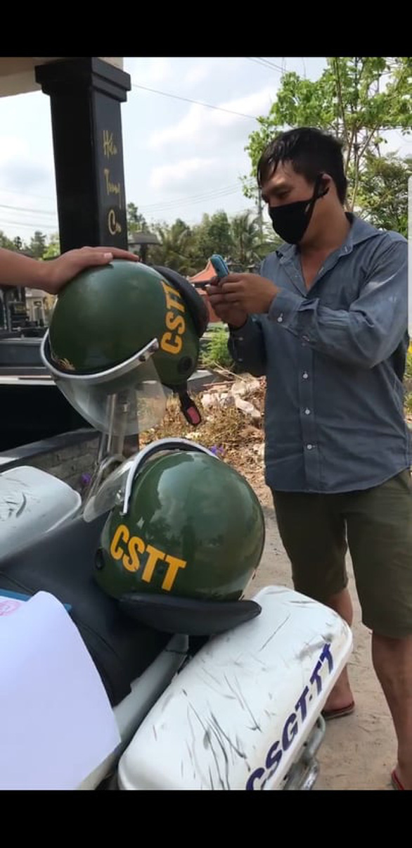 Làm rõ nghi vấn cảnh sát trật tự ở Đồng Nai quay clip tố cáo xe gửi sếp - Ảnh 2.