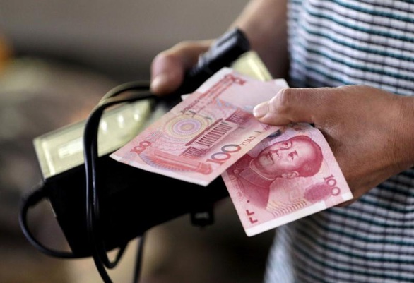 Trung Quốc khử trùng tiền mặt, in tiền mới cho Vũ Hán giữa dịch COVID-19 - Ảnh 1. Trung Quốc khử trùng tiền mặt, in tiền mới cho Vũ Hán giữa dịch COVID-19 - Ảnh 1.
