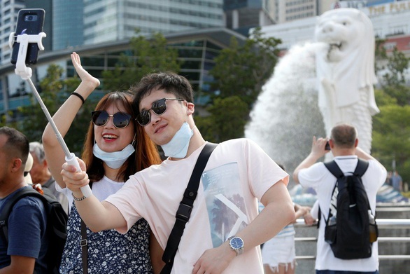 Sợ virus corona, du khách tránh Trung Quốc, né luôn Singapore và Nhật - Ảnh 1. Sợ virus corona, du khách tránh Trung Quốc, né luôn Singapore và Nhật - Ảnh 1.