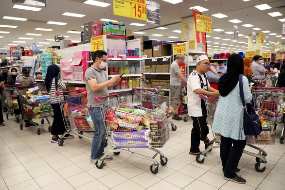 Malaysia đóng cửa biên giới, phong tỏa nhiều nơi vì COVID-19 - Ảnh 1. Malaysia đóng cửa biên giới, phong tỏa nhiều nơi vì COVID-19 - Ảnh 1.