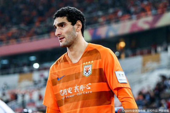 Cựu tiền vệ Manchester United Fellaini nhiễm corona ở Trung Quốc - Ảnh 1. Cựu tiền vệ Manchester United Fellaini nhiễm corona ở Trung Quốc - Ảnh 1.