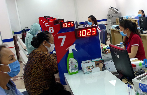 Người vay ngân hàng trả góp lao đao - Ảnh 1. Người vay ngân hàng trả góp lao đao - Ảnh 1.