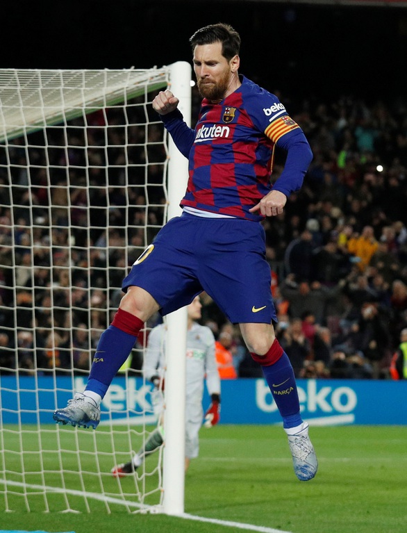 Messi ghi bàn từ chấm 11m đưa Barca lên ngôi đầu - Ảnh 1. Messi ghi bàn từ chấm 11m đưa Barca lên ngôi đầu - Ảnh 1.