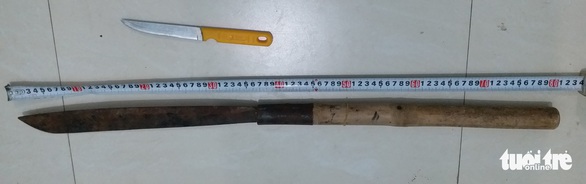 Khởi tố chủ quán xách mã tấu đuổi đánh tổ kiểm tra phòng dịch - Ảnh 2. Khởi tố chủ quán xách mã tấu đuổi đánh tổ kiểm tra phòng dịch - Ảnh 2.