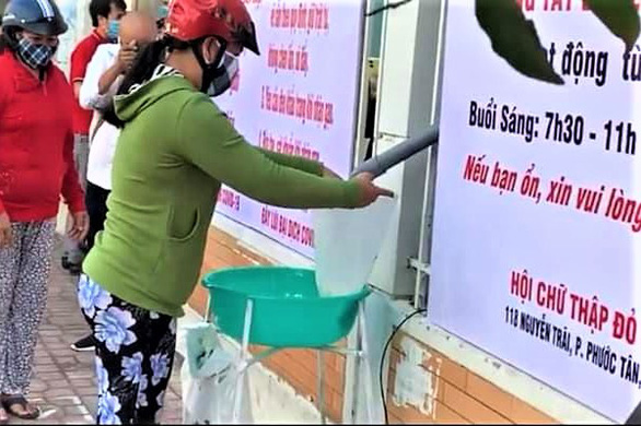 ATM gạo tại Nha Trang khai trương, phục vụ 500 suất/2kg/ngày - Ảnh 3.