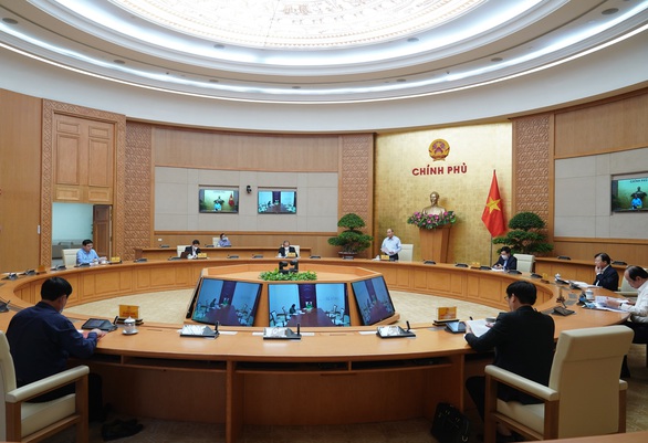 270 ca/100 triệu dân, hệ số lây nhiễm ở Việt Nam thuộc nhóm thấp nhất thế giới - Ảnh 1. 270 ca/100 triệu dân, hệ số lây nhiễm ở Việt Nam thuộc nhóm thấp nhất thế giới - Ảnh 1.