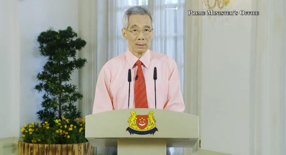 Singapore đóng trường học, công sở, thay đổi quan điểm về... khẩu trang - Ảnh 1. Singapore đóng trường học, công sở, thay đổi quan điểm về... khẩu trang - Ảnh 1.