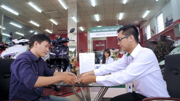 Vì sao các khoản vay tiêu dùng lại có mức lãi suất cao hơn ngân hàng? - Ảnh 1. Vì sao các khoản vay tiêu dùng lại có mức lãi suất cao hơn ngân hàng? - Ảnh 1.
