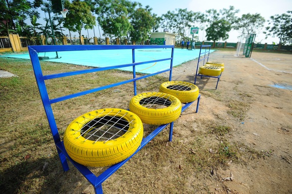 Sẽ có thêm 30 sân chơi năng động từ lốp xe cho trẻ em - Ảnh 4. Sẽ có thêm 30 sân chơi năng động từ lốp xe cho trẻ em - Ảnh 4.