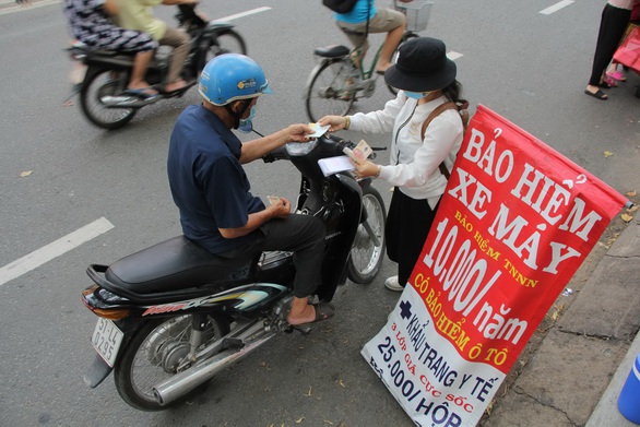 Bảo hiểm xe máy: ‘Có vấn đề’ về cách thức triển khai, sửa sai thế nào? - Ảnh 1. Bảo hiểm xe máy: ‘Có vấn đề’ về cách thức triển khai, sửa sai thế nào? - Ảnh 1.