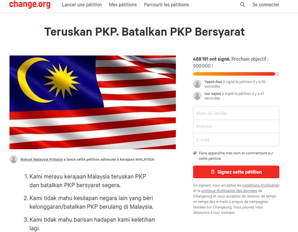Nửa triệu người Malaysia ký tên đòi phong tỏa tiếp - Ảnh 1.