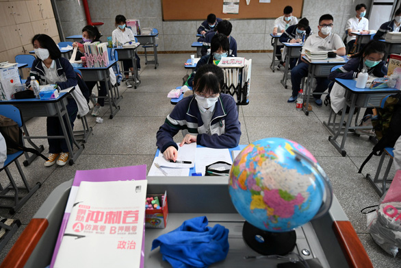 Dịch COVID-19 chiều 6-5: Học sinh Vũ Hán trở lại trường, Hàn Quốc khôi phục phần lớn nhịp sống - Ảnh 2.