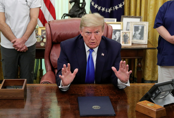 Ông Trump nói COVID-19 còn tệ hơn vụ khủng bố 11-9 - Ảnh 1. Ông Trump nói COVID-19 còn tệ hơn vụ khủng bố 11-9 - Ảnh 1.