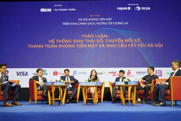 Ngân hàng Nhà nước và doanh nghiệp chung tay thúc đẩy thanh toán không dùng tiền mặt - Ảnh 1. Ngân hàng Nhà nước và doanh nghiệp chung tay thúc đẩy thanh toán không dùng tiền mặt - Ảnh 1.