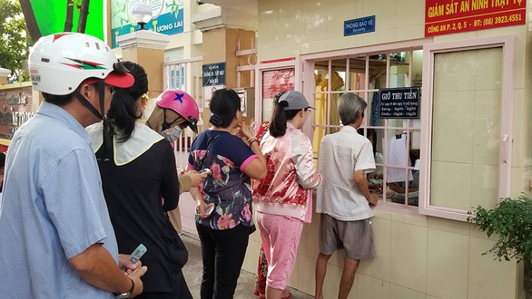 TP.HCM kiến nghị sớm cho cơ quan nhà nước trả phí dịch vụ ngân hàng - Ảnh 1. TP.HCM kiến nghị sớm cho cơ quan nhà nước trả phí dịch vụ ngân hàng - Ảnh 1.