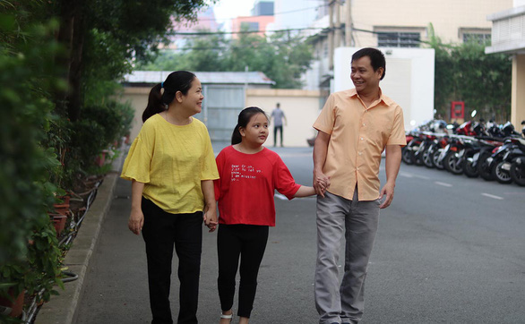 Yêu thương biến bi kịch thành nụ cười - Ảnh 1. Yêu thương biến bi kịch thành nụ cười - Ảnh 1.
