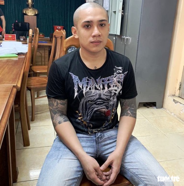Nghi phạm khởi nguồn mâu thuẫn vụ ‘băng áo cam’ ở Bình Tân ra đầu thú - Ảnh 1. Nghi phạm khởi nguồn mâu thuẫn vụ ‘băng áo cam’ ở Bình Tân ra đầu thú - Ảnh 1.