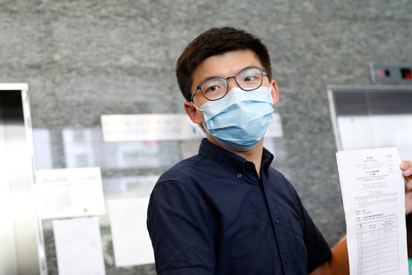 Joshua Wong nằm trong 12 ứng viên bị Hong Kong tước tranh cử vào cơ quan lập pháp - Ảnh 1. Joshua Wong nằm trong 12 ứng viên bị Hong Kong tước tranh cử vào cơ quan lập pháp - Ảnh 1.