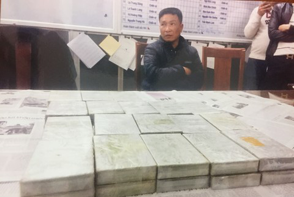 Đại gia đình mua bán 80 bánh heroin: 2 người tử hình, 3 người chung thân - Ảnh 1. Đại gia đình mua bán 80 bánh heroin: 2 người tử hình, 3 người chung thân - Ảnh 1.
