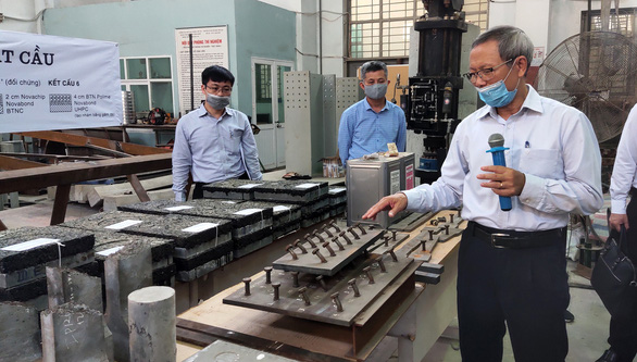 Thử nghiệm sửa 120m mặt cầu Thăng Long - Ảnh 5. Thử nghiệm sửa 120m mặt cầu Thăng Long - Ảnh 5.