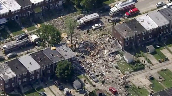Nhiều ngôi nhà ở Baltimore, Mỹ bị san phẳng sau tiếng nổ lớn - Ảnh 1.