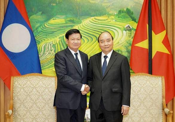 Thủ tướng Lào dự lễ tang nguyên Tổng bí thư Lê Khả Phiêu - Ảnh 1. Thủ tướng Lào dự lễ tang nguyên Tổng bí thư Lê Khả Phiêu - Ảnh 1.