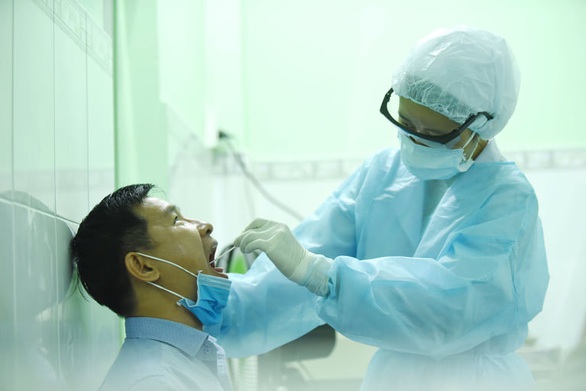 TP.HCM mở rộng xét nghiệm COVID-19 với 4 tỉnh thành có ổ dịch - Ảnh 1. TP.HCM mở rộng xét nghiệm COVID-19 với 4 tỉnh thành có ổ dịch - Ảnh 1.