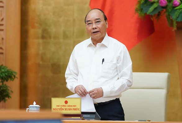 Thủ tướng Nguyễn Xuân Phúc: ‘Sớm sửa đổi chính sách hỗ trợ người mất việc do COVID-19 - Ảnh 1. Thủ tướng Nguyễn Xuân Phúc: ‘Sớm sửa đổi chính sách hỗ trợ người mất việc do COVID-19 - Ảnh 1.