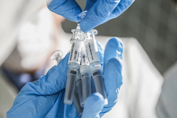 Trung Quốc công bố giá vắc-xin COVID-19 đắt nhất thế giới - Ảnh 1.