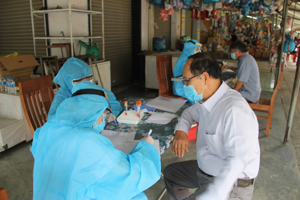 Nhân viên ban quản lý chợ Lầu Đèn mắc COVID-19, Đà Nẵng tìm người liên quan - Ảnh 1. Nhân viên ban quản lý chợ Lầu Đèn mắc COVID-19, Đà Nẵng tìm người liên quan - Ảnh 1.