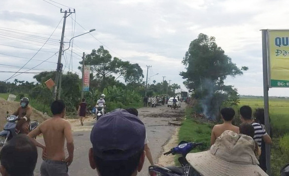 Tiếng nổ lớn phát ra từ đống rác cháy bên đường, một phụ nữ tử vong - Ảnh 1. Tiếng nổ lớn phát ra từ đống rác cháy bên đường, một phụ nữ tử vong - Ảnh 1.