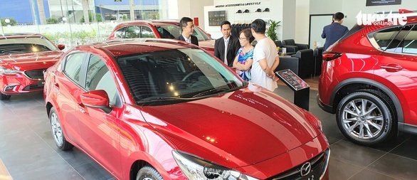 Giá tính lệ phí trước bạ ôtô: giảm cho xe trong nước, tăng với xe nhập ngoại - Ảnh 1. Giá tính lệ phí trước bạ ôtô: giảm cho xe trong nước, tăng với xe nhập ngoại - Ảnh 1.