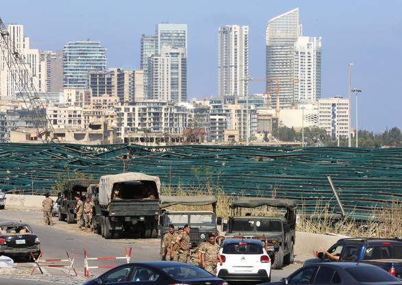 Tổng thống Lebanon: Nổ ở Beirut có thể do bên ngoài can thiệp - Ảnh 1. Tổng thống Lebanon: Nổ ở Beirut có thể do bên ngoài can thiệp - Ảnh 1.