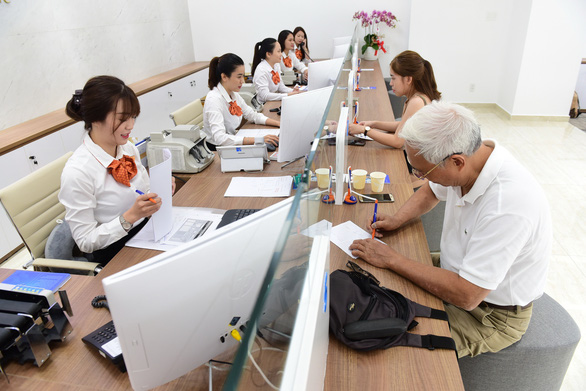 Are visitors to the bank invited, even required to buy insurance?  Photo 1.