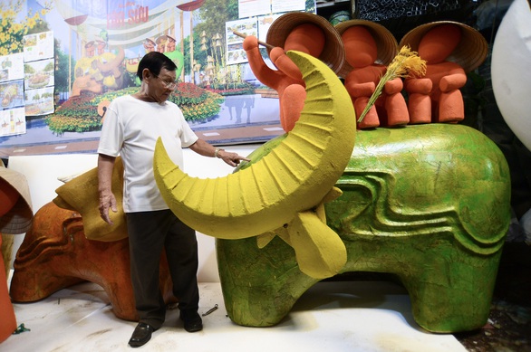 Du xuân đường hoa Nguyễn Huệ an toàn, du khách cần tuân thủ 5K - Ảnh 1. Du xuân đường hoa Nguyễn Huệ an toàn, du khách cần tuân thủ 5K - Ảnh 1.