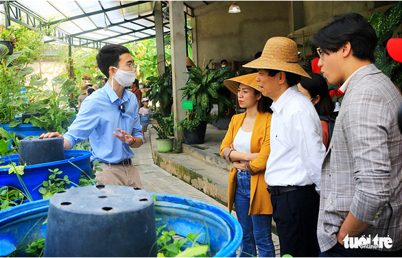 A moment of Vietnam tourism back into operation with science - technology space - Photo 4.