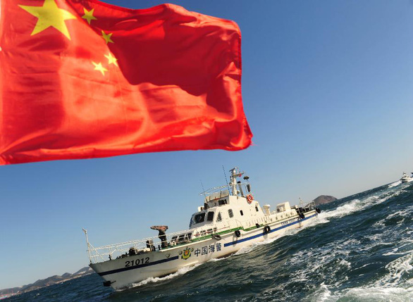 Trung Quốc thông qua luật cho phép lực lượng hải cảnh bắn tàu nước ngoài - Ảnh 1.