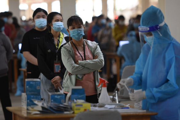 Đồng Nai thí điểm điều trị F0 tại nhà, chuẩn bị cho học sinh trở lại trường - Ảnh 1.