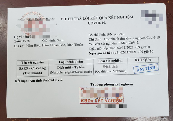 Bắt giữ 4 người buôn bán giấy xét nghiệm COVID-19 giả tại Phan Thiết - Ảnh 1.