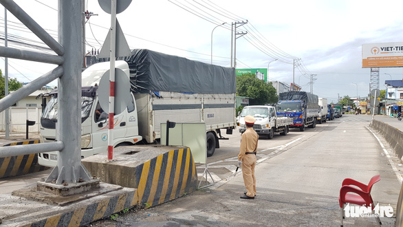 Doanh nghiệp bức xúc vì đã tiêm vắc xin và có giấy âm tính vẫn kêu… test lại - Ảnh 1.