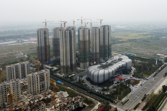 Evergrande nối lại 10 dự án, báo Trung Quốc tiếp tục trấn an - Ảnh 1.