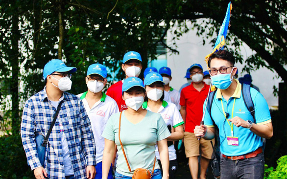 Saigontourist tặng bảo hiểm COVID cho du khách - Ảnh 1. Saigontourist tặng bảo hiểm COVID cho du khách - Ảnh 1.