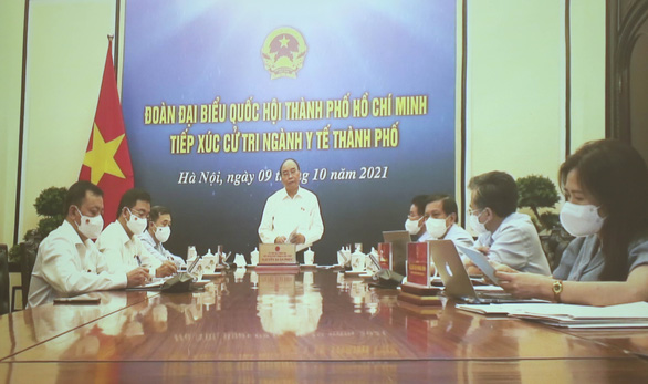 Chủ tịch nước Nguyễn Xuân Phúc: TP.HCM từng bước mở cửa nhưng phải kiểm soát rủi ro - Ảnh 1.