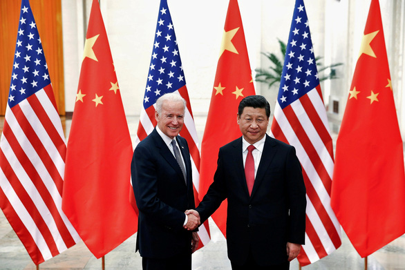 Ông Biden ký luật siết chặt các hạn chế với Huawei và ZTE của Trung Quốc - Ảnh 1.