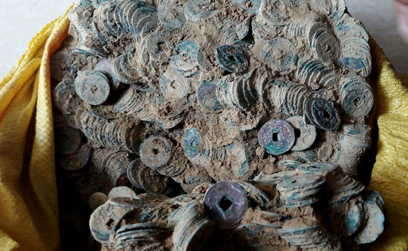 Phát hiện hũ tiền cổ Trung Quốc thời Bắc Tống, Kim, Minh nặng 27kg trên sông Hiếu - Ảnh 1.