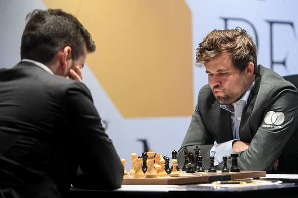 Carlsen thắng ván cờ triệu USD - Ảnh 1.
