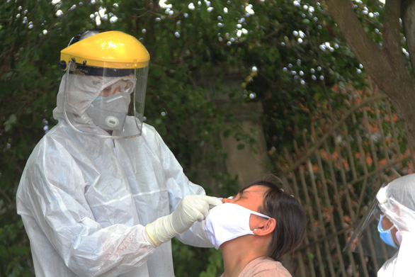 Tam Ky isolated, brought together people from neighborhoods and communes with COVID-19 cases in Ho Chi Minh city - Photo 1.